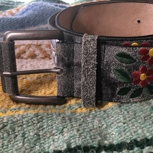 Embroidered leather belt.